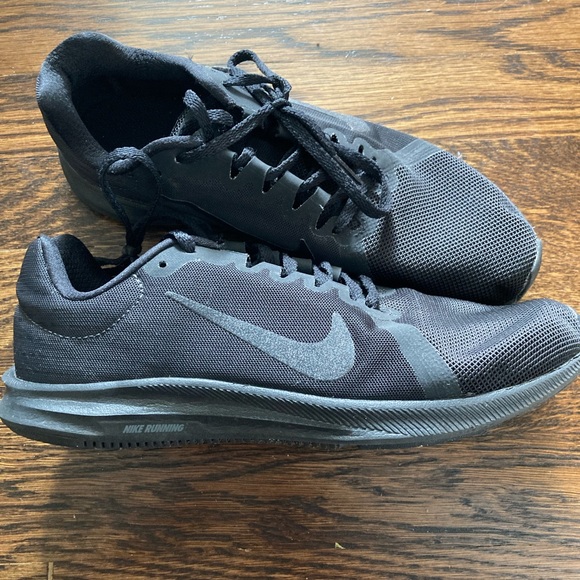 Nike Shoes - Nike sneaker. All black. Worn a few times but in great condition. Basic sneaker!